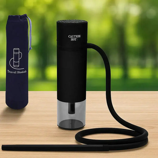 Portable travel hookah with hose and carrying bag on a wooden table, outdoor background