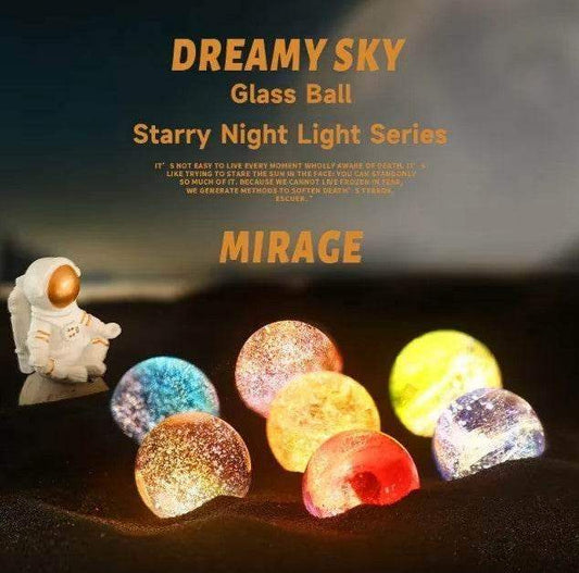 Colorful glass ball night lights from the Dreamy Sky series with astronaut figurine