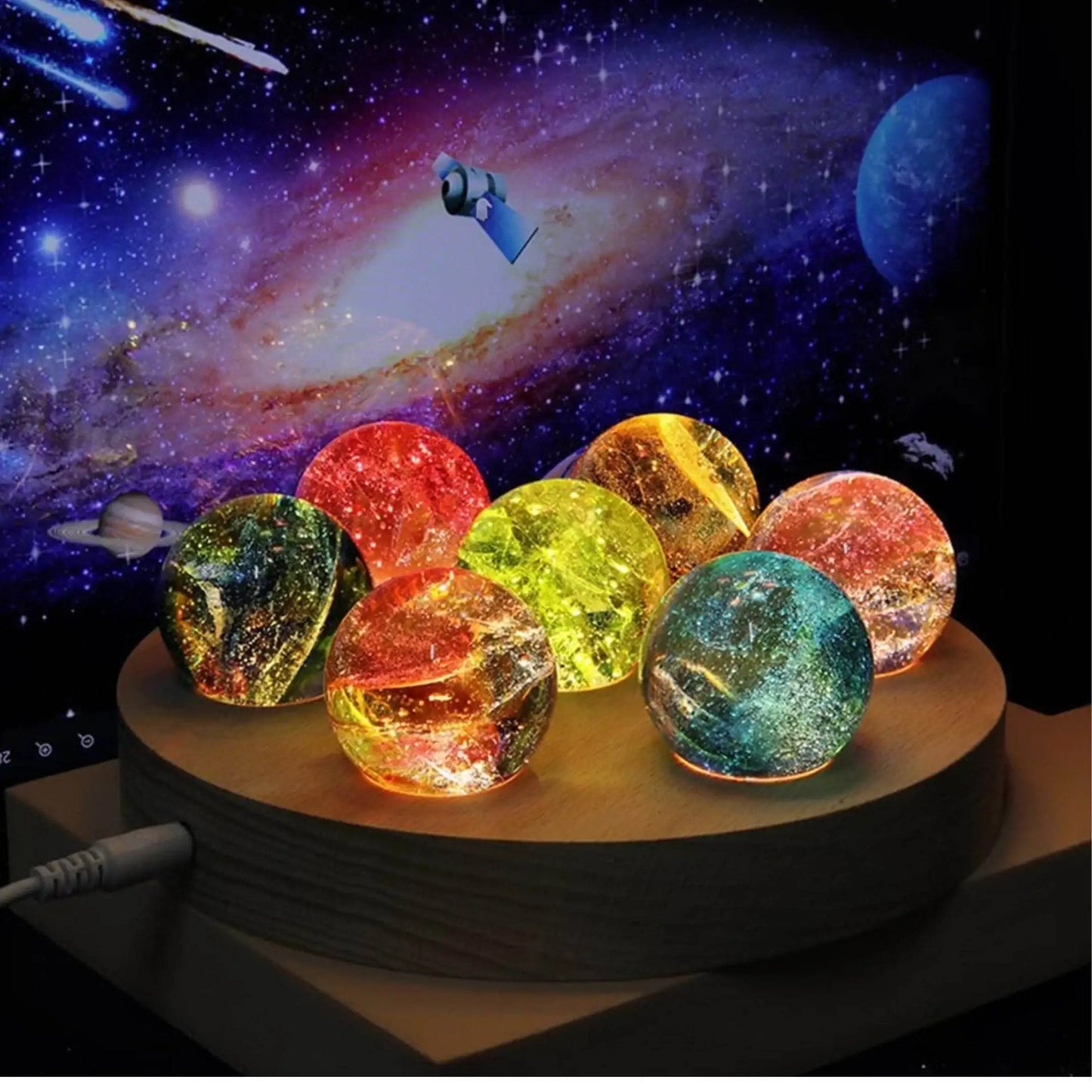 Colorful crystal ball LED night lights on round wooden base with galaxy background