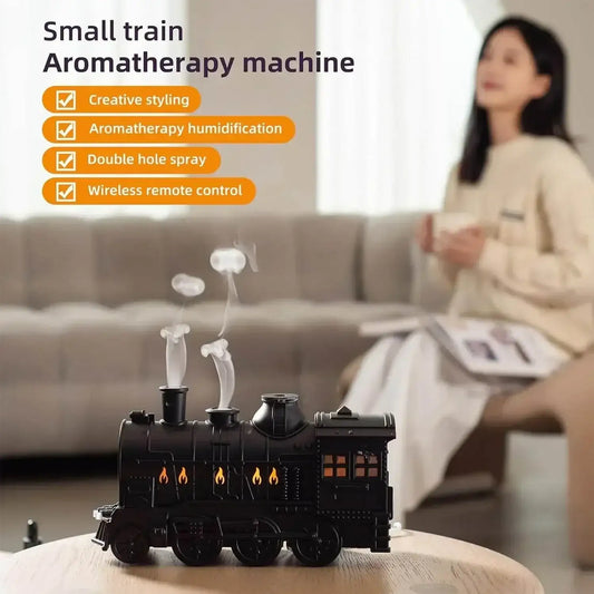 Small train-shaped aromatherapy humidifier with steam feature on a table in cozy living room